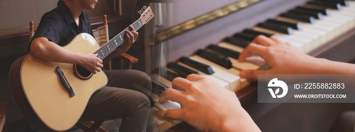 Concept of musical class, School course study banner, poster background, widescreen for advertisement. Guitar and piano player. Practice guitar and piano.