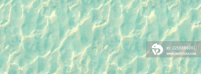 Swimming pool bottom caustics ripple and flow with waves background. Summer background. Texture of water surface. Overhead view. Reflection of Sun in Water, Gentle wave in swimming pool down part