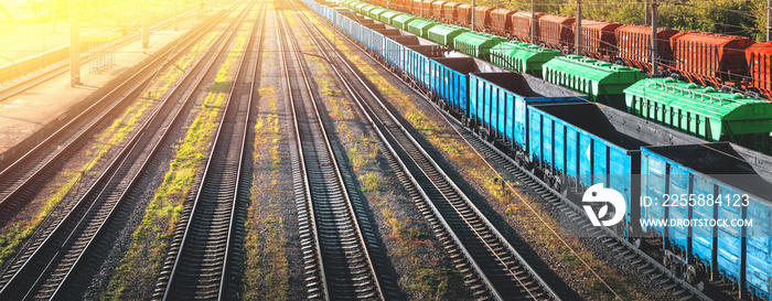 Railway station of freight trains from a height at sunset