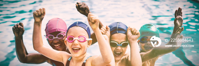 Cheerful children enjoying at poolside