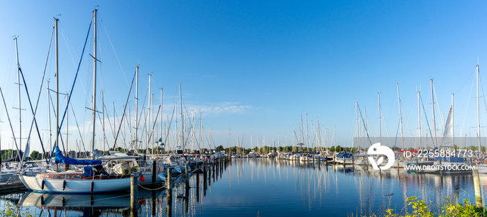 panorama view of the marina and yacht harbor in Middelfart in southern Denmark in warm evening light