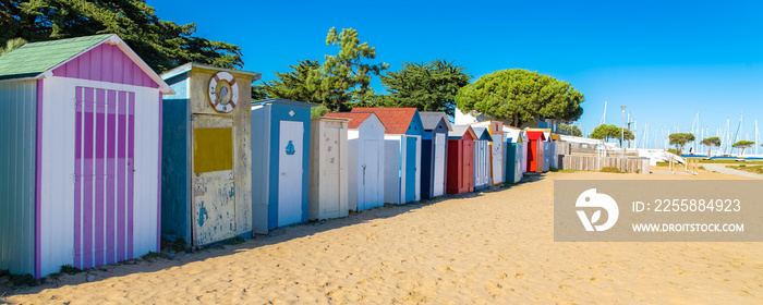 Wooden beach cabins on the Oleron island in France, colorful huts