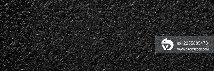 Wide black asphalt texture. asphalt road. stone asphalt texture background black granite gravel.