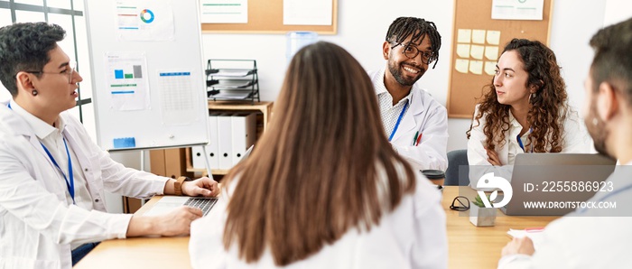 Group of young doctor people discussing in a medical meeting at the clinic office.