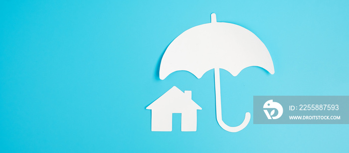 Umbrella cover Home paper on blue background. Warranty, Maintenance, real estate and insurance concept