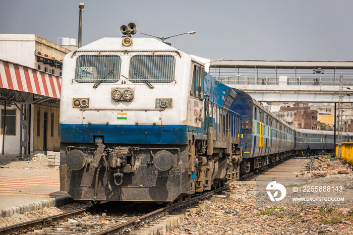 Atrain arriving at the railway station in agra india unesco site.