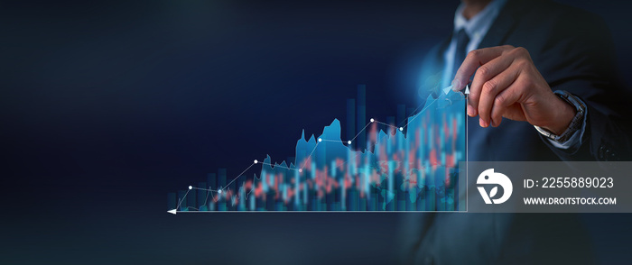 Close up of Businesswoman using pen pointing arrow graph. Business development to success, profit and growing growth plan.