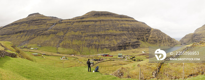 Green mountain hill landscape at Saksun village on the Faroe Islands, Denmark.