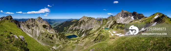Panoramic view of the Allgäu alps, Germany, with lakes and Nebelhorn mountain.