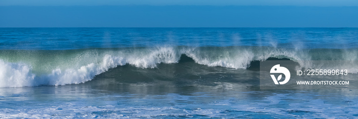 Wave crashing on the shore at Half Moon Bay, California, beautiful beach