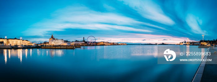 Helsinki, Finland. View Of Embankment With Ferris Wheel And Uspenski Cathedral In Illuminations During Morning Sunrise Time.