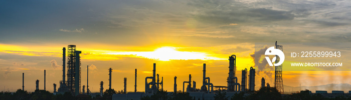 Industrial Estate ,Refinery factory and oil storage tank,petrochemical plant area with beautify sky at sunset