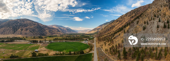 Aerial View of Scenic Road, Hwy 3, in the valley around the Canadian Mountain Landscape. Near Osoyoos, British Columbia, Canada. Panorama