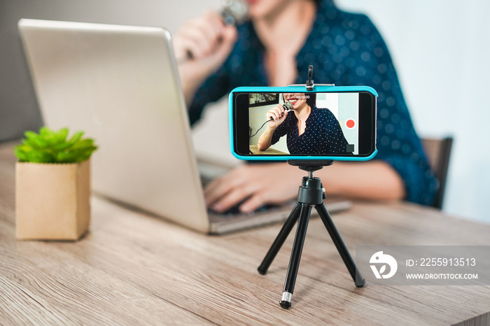 Girl influencer girl preparing video set while creating social media contents - Young woman having f