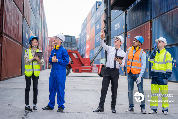 Engineer team and Businessman planning the transportation of goods for import or export in the conta