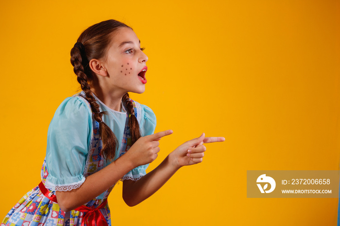 Child in typical clothes of famous Brazilian party called  Festa Junina  in celebration of São João.