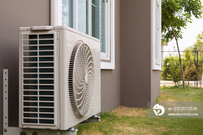 Air conditioner compressor outdoor unit installed outside the house