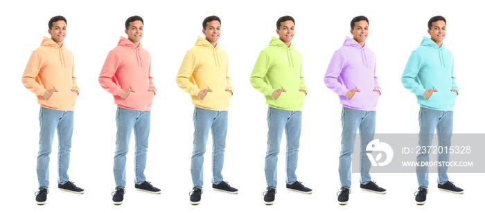 Young man wearing stylish hoodies in different colors on white background