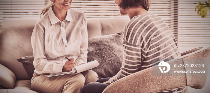 Smiling therapist with patient