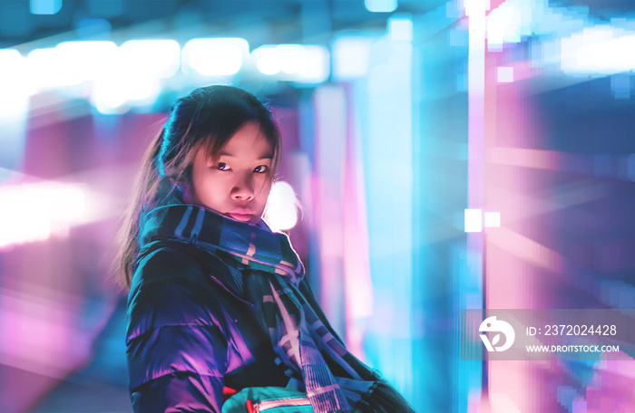 Asian Woman with Futuristic neon cyber punk color tone and background for Cyber and Technology conce