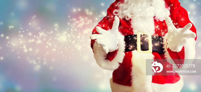 Santa with holding gesture on a shiny light background