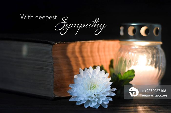 Sympathy card with white chrysanthemum flower and burning candle