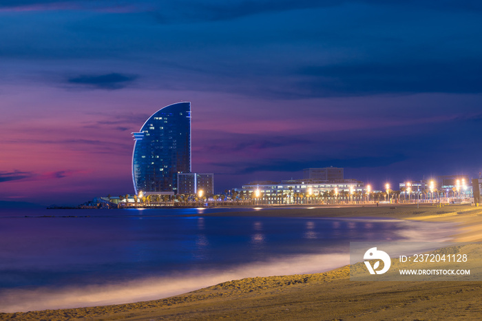 Barcelona Beach in summer night along seaside in Barcelona, Spain. Mediterranean Sea in Spain.