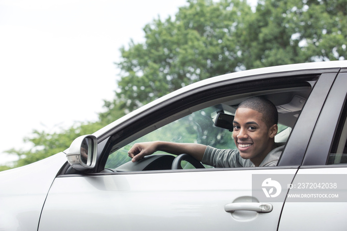 Teenagers driving car