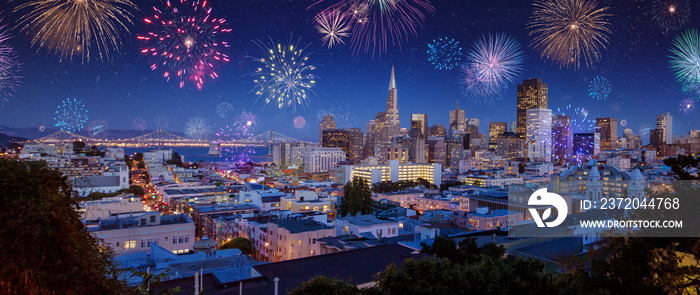 Downtown San Francisco cityscape with Bay Bridge in a bright night/late sunset