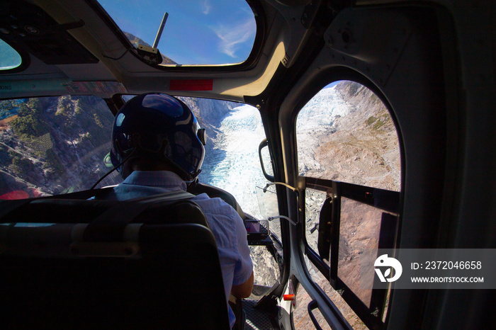 In a helicopter flying towards a glacier in Franz Josef New-Zealand