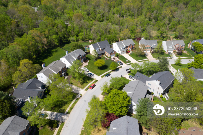 upper middle class american neighborhood with curving street in Maryland