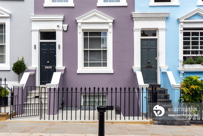 Entrances to some typical english row houses seen in Notting Hill, London