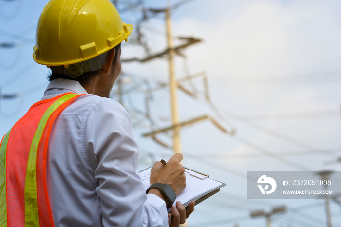 Asian Engineer Standing outdoor on a Constructions, Checking Item ,Engineer Checking Item