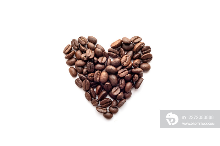 Heart shape of roasted coffee beans isolated on a white background.