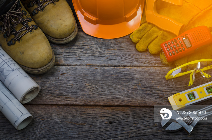 Construction tools with helmet on table