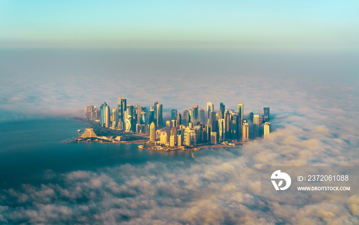 Aerial view of Doha through the morning fog - Qatar, the Persian Gulf