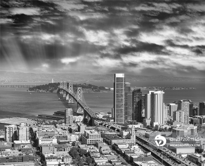 Aerial view of San Francisco main road and Bay Bridge with city skyline