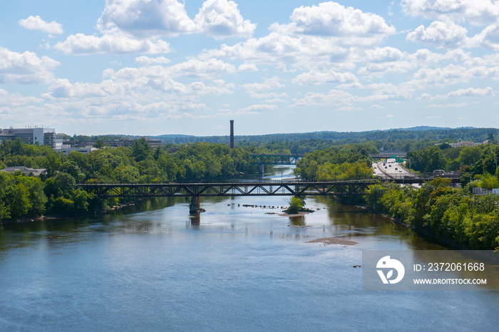 Aerial view of Merrimack River and Historic mill buildings near downtown Manchester, New Hampshire N