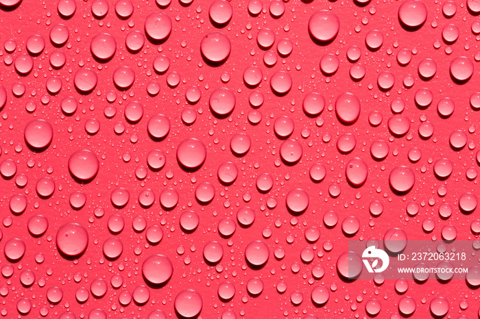 red water drops on a surface