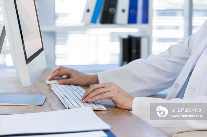 Female doctor working on computer