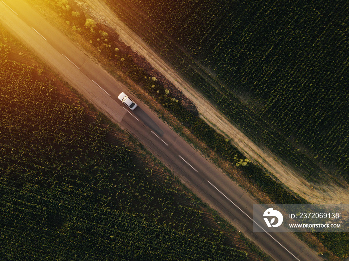 Aerial view of lonely car on the road