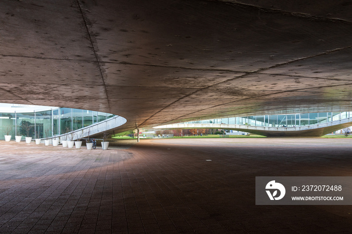 Exterior ground floor of ,  Learning Center (EPFL) in Lausanne, Switzerland with fascinate concrete 