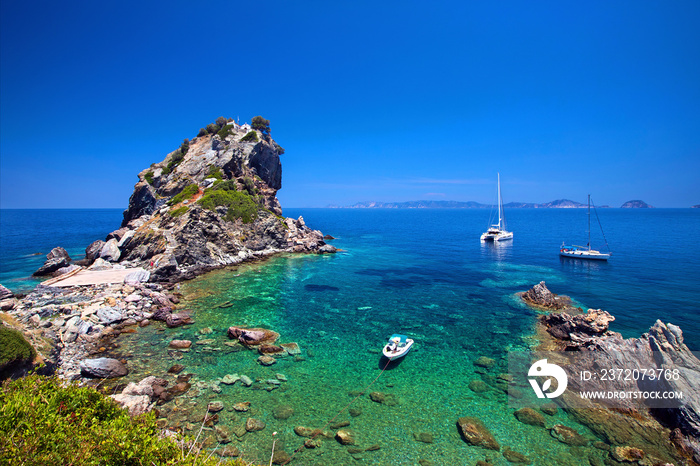 SKOPELOS ISLAND, NORTHERN SPORADES, GREECE. Agios Ioannis ( Ai Giannis sto Kastri ) church and beach