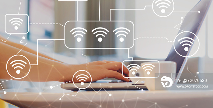 WiFi with woman using a laptop on a coffee table