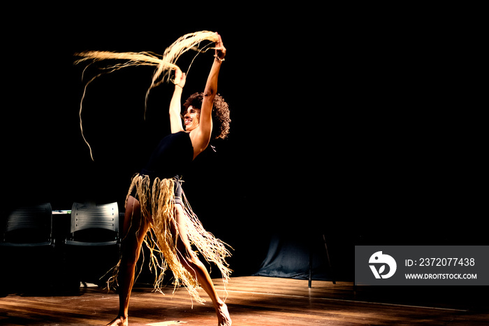 Contemporary dancer seen in the theater.