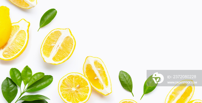 Fresh lemon and  slices with leaves isolated on white