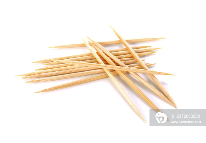 Wooden toothpicks on white background