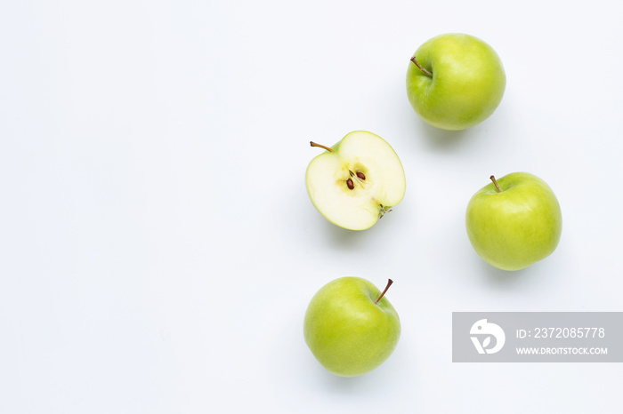 Green apples on white background.