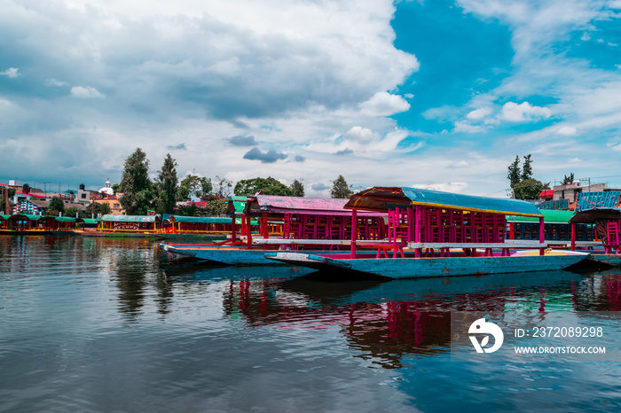 Mexican colorful trajineras on Xochimilcos lake.