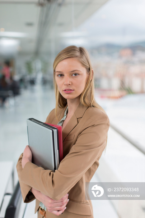 Portrait confident young businesswoman in office